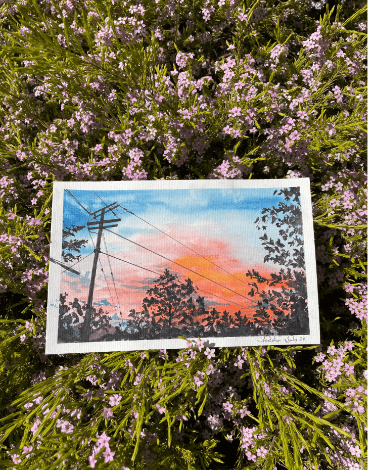 Painting of a sunset sky with power lines and trees, situated on blooming purple flowers.